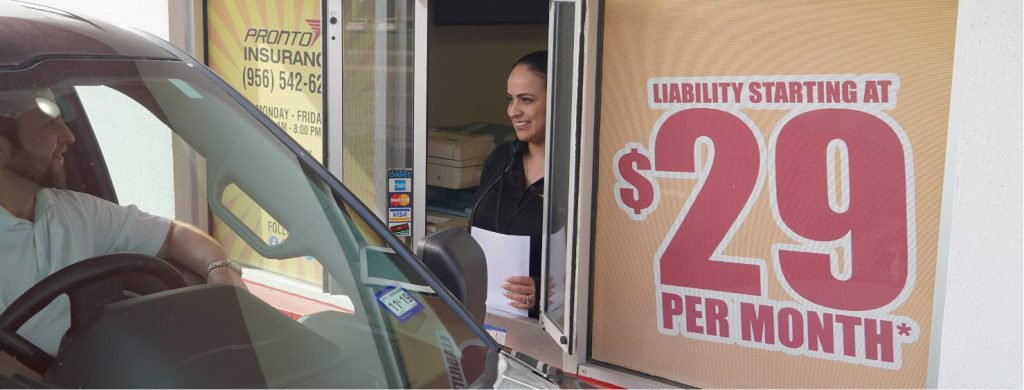 Pronto drive thru window with sign saying "Liability starting at $29 per month*"